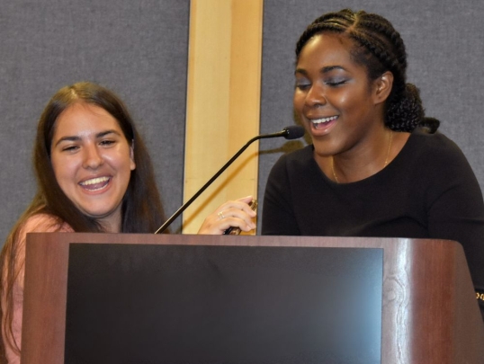 Students in front of classmates presenting