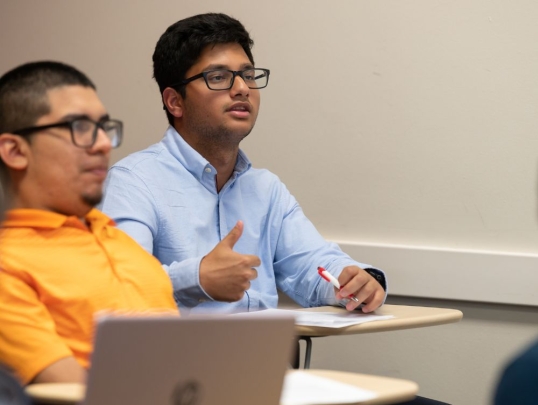 Student providing feedback to classmates