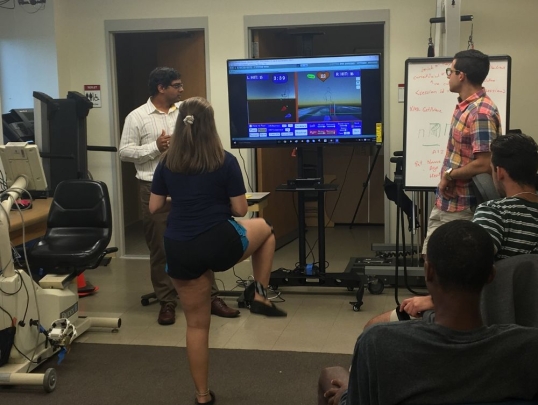 Student trying out a physical therapy demo