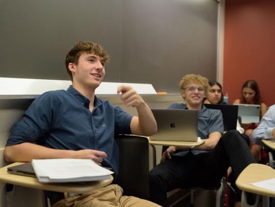 Student providing feedback to classmates