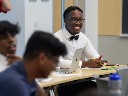 Student providing feedback to classmates